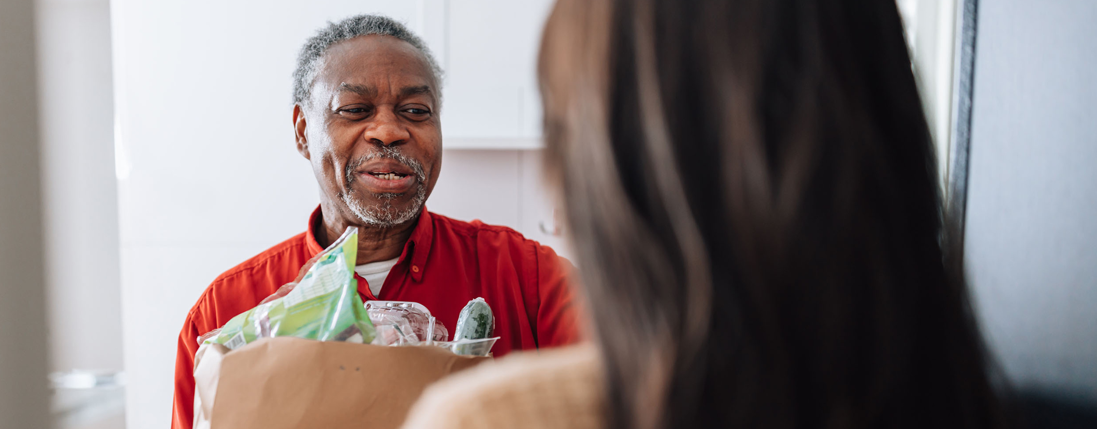 Man receiving groceries