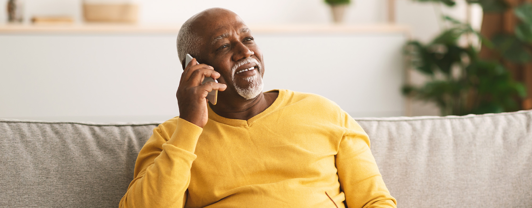 Medicare beneficiary talking on phone 
